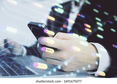 Multi exposure of man's hand holding and using a digital device and data theme drawing. Innovation concept. - Shutterstock ID 1691675077