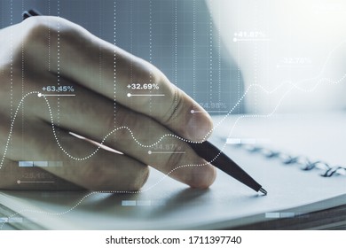 Multi exposure of stats data illustration with man hand writing in notebook on background, computing and analytics concept