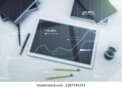 Multi exposure of stats data illustration and modern digital tablet on background, top view, computing and analytics concept