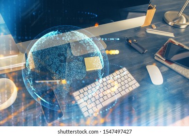 Multi exposure of table with computer and world map hologram. International data network concept.