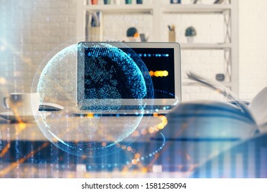 Multi exposure of table with computer and world map hologram. International data network concept.