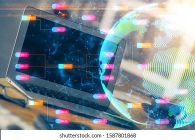 Multi exposure of table with computer and world map hologram. International data network concept.