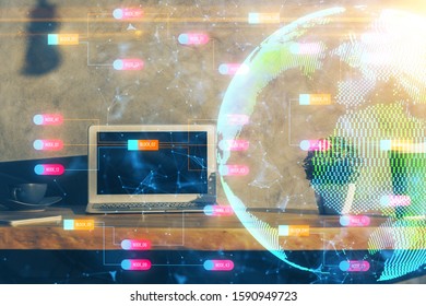 Multi exposure of table with computer and world map hologram. International data network concept.