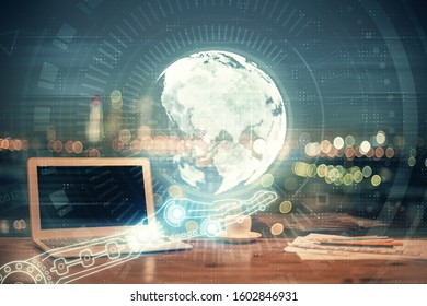 Multi exposure of table with computer and world map hologram. International data network concept.