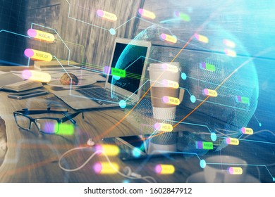 Multi exposure of table with computer and world map hologram. International data network concept.
