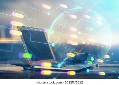 Multi exposure of table with computer and world map hologram. International data network concept.