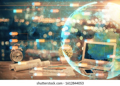 Multi exposure of table with computer and world map hologram. International data network concept.