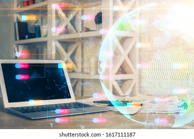 Multi exposure of table with computer and world map hologram. International data network concept.