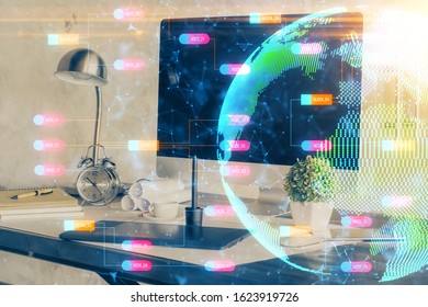 Multi exposure of table with computer and world map hologram. International data network concept.