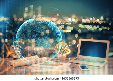 Multi exposure of table with computer and world map hologram. International data network concept.