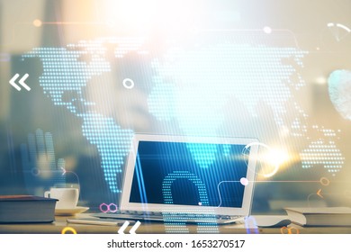 Multi exposure of table with computer and world map hologram. International data network concept.