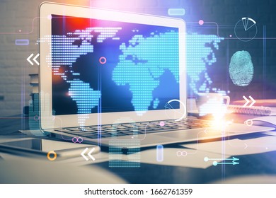 Multi exposure of table with computer and world map hologram. International data network concept.
