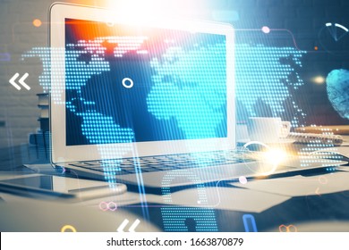 Multi exposure of table with computer and world map hologram. International data network concept. - Powered by Shutterstock - Get 15% off with code: PIKWIZARD15