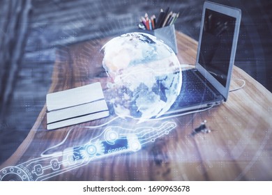 Multi exposure of table with computer and world map hologram. International data network concept.