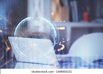 Multi exposure of table with computer and world map hologram. International data network concept.