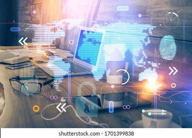 Multi exposure of table with computer and world map hologram. International data network concept.