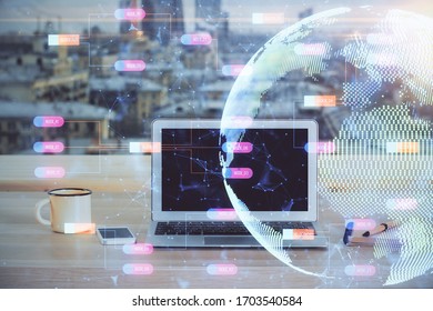 Multi exposure of table with computer and world map hologram. International data network concept.