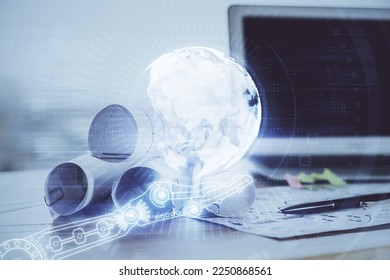Multi exposure of table with computer and world map hologram. International data network concept.