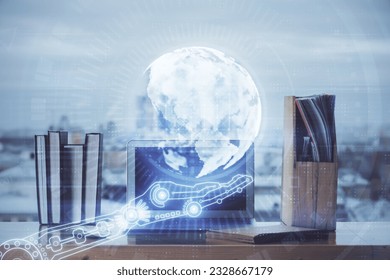 Multi exposure of table with computer and world map hologram. International data network concept.