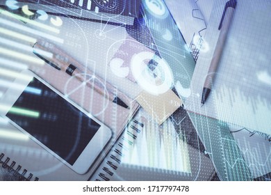 Multi exposure of technology theme drawing over work table desktop. Top view. Global data analysis concept.