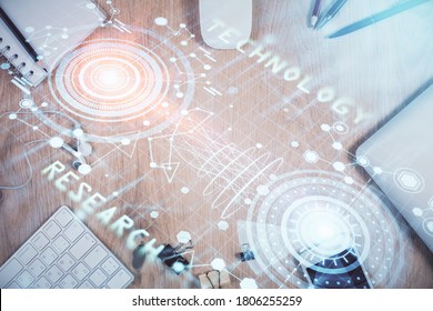 Multi exposure of technology theme drawing over work table desktop. Top view. Global data analysis concept.