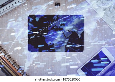 Multi exposure of technology theme drawing over work table desktop. Top view. Global data analysis concept.