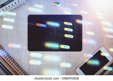 Multi exposure of technology theme drawing over work table desktop. Top view. Global data analysis concept.