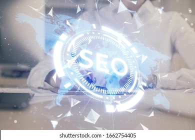 Multi exposure of woman's hands making notes with SEO icon. Concept of Search engine optimization