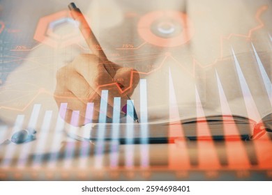 Multi exposure of woman's hands making notes with forex graph hologram. Concept stock market analysis.