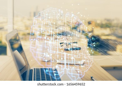 Multi exposure of work space with computer and human brain hologram. Brainstorm concept.