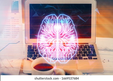 Multi exposure of work space with computer and human brain hologram. Brainstorm concept.