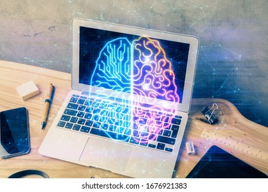 Multi exposure of work space with computer and human brain hologram. Brainstorm concept.