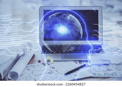Multi exposure of work space with computer and human brain hologram. Brainstorm concept.