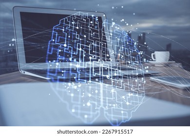 Multi exposure of work space with computer and human brain hologram. Brainstorm concept.