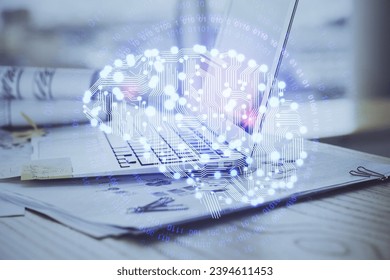 Multi exposure of work space with computer and human brain hologram. Brainstorm concept.