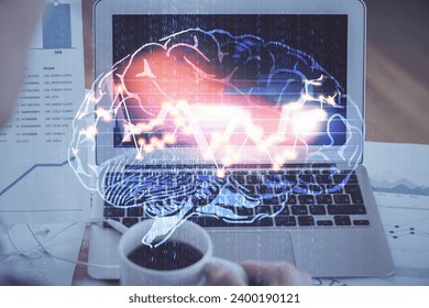 Multi exposure of work space with computer and human brain hologram. Brainstorm concept.