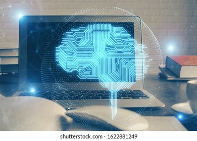 Multi exposure of work table with computer and brain hologram. Brainstorm concept.