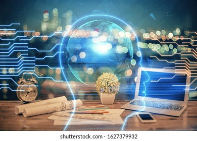 Multi exposure of work table with computer and brain hologram. Brainstorm concept.