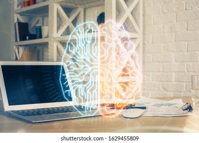 Multi exposure of work table with computer and brain hologram. Brainstorm concept.