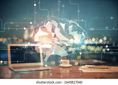 Multi exposure of work table with computer and brain hologram. Brainstorm concept.