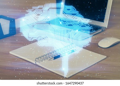 Multi exposure of work table with computer and brain hologram. Brainstorm concept.