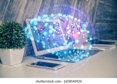 Multi exposure of work table with computer and brain hologram. Brainstorm concept.