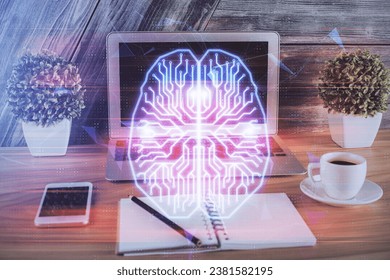 Multi exposure of work table with computer and brain hologram. Brainstorm concept.