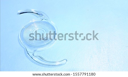 Multi focal intraocular lens on bright blue background