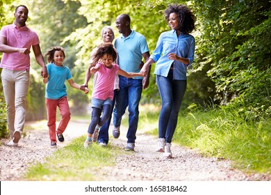 Multi Generation African American Family On Country Walk - Powered by Shutterstock