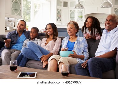 Multi Generation Black Family Watching Movie On TV Together