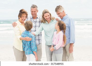 Multi Generation Family All Together At The Beach