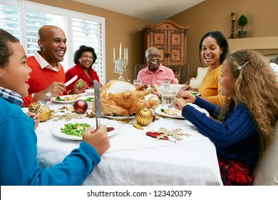 Multi Generation Family Celebrating With Christmas Meal