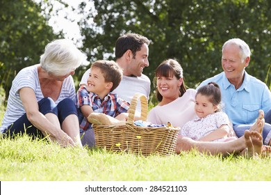 Multi Generation Family Enjoying Picnic In Countryside - Powered by Shutterstock