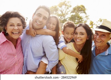 Multi Generation Family Having Fun In Garden Together - Shutterstock ID 284522969